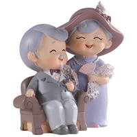 Postavite djed i baku smola za figurice na radnoj površini poklona kućica